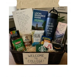 Welcome Home basket with snacks, a water bottle, and a handwritten note